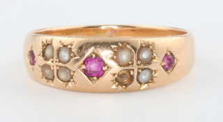 A 15ct yellow gold ruby and pearl ring size S