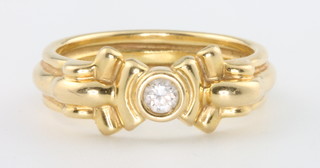 An 18ct yellow gold diamond set ring size M 