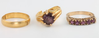 A 22ct gold wedding band 3.2 grams, 2 gem set rings 