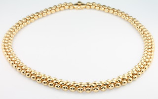 An 18ct yellow gold fancy link reversible necklace 69.5 grams with original Mappin & Webb box 