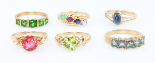 Six 9ct yellow gold gem set rings, size N, N, N, N, N and O