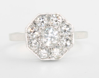 An 18ct white gold diamond set octagonal 9 stone ring, 1.05ct, size M 1/2