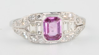 An 18ct white gold ruby and diamond ring size O 1/2