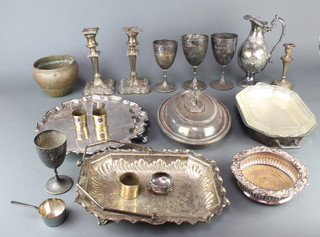 A silver plated salver with Chippendale rim on scroll feet 12" and other plated items