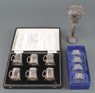 A cased set of 6 miniature plated mugs with glass bottoms