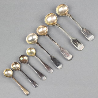 A pair of Victorian silver mustard spoons London 1838 and 4 other silver salt spoons, 2 plated spoons 