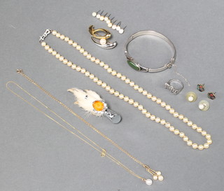 A 9ct yellow gold pearl set necklace, a triple ditto and minor costume jewellery