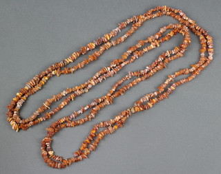 Two strands of natural amber beads