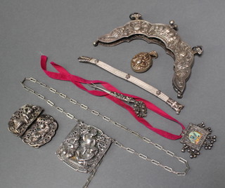 An Indian repousse silver buckle, a ditto pendant, 1 other with painted panel and minor costume jewellery