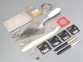 A Victorian silver plated chased trowel with ivory handle, a plated cigarette case and minor items 