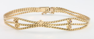 A 9ct yellow gold amethyst set bracelet 7 grams