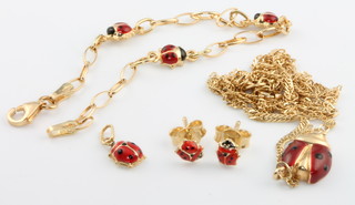 An 18ct yellow gold enamelled ladybird necklace, earrings and pendant 