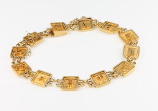 An 18ct yellow gold signs of the Zodiac bracelet, 11 grams 