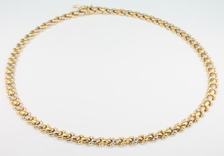 An 18ct 2 colour gold necklace 25 grams
