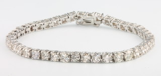 An 18ct white gold brilliant cut diamond tennis bracelet approx. 8.3ct 180mm long