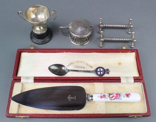 A silver twin handled trophy cup 2" and minor plated items