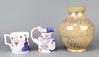 A 19th Century lustre mug, an Ironstone jug and a Lancastrian pottery baluster vase with mottled decoration 9" 
