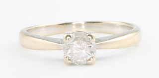 A white gold single stone diamond ring approx 0.5ct, colour H/I, clarity I3 together with a certificate, size L