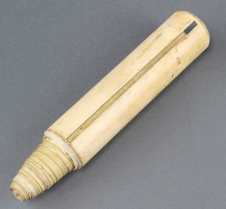 A 19th Century Torah contained in an ivory cylinder 6"