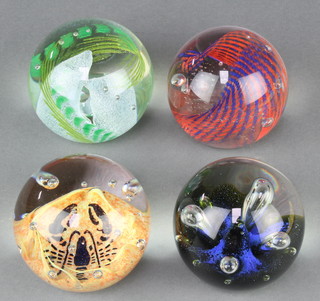 A Caithness Crystal moon flower paperweight 3", a do. Tartan, do. Lobster and a free form ditto 