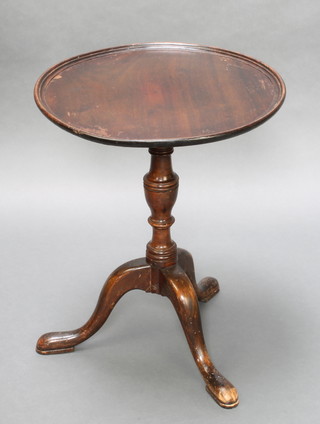 A Georgian style circular dish top wine table, raised on baluster turned column and tripod support 23"h x 18" diam. 