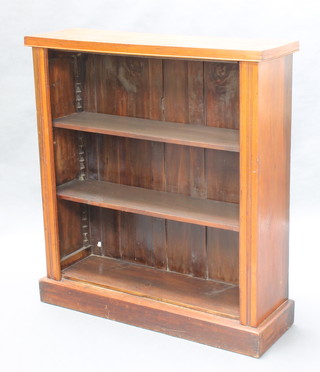 A Victorian mahogany bookcase fitted adjustable shelves, raised on a platform base 42 1/2"h x 39"w x 12"d 