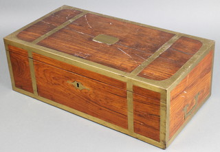 A Victorian rosewood and brass banded writing slope with hinged lid, the base fitted a drawer 6"h x 18 1/2"w x 10"d 