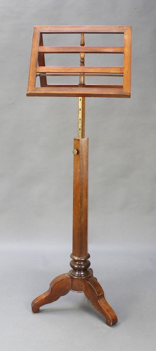 A Victorian adjustable rosewood duet stand raised on a chamfered column and tripod base 56"h x 18" x 16" 