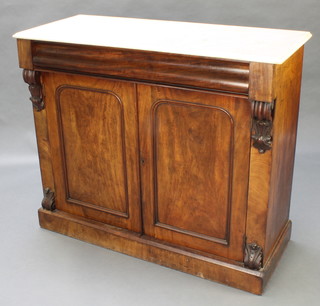 A 19th Century mahogany chiffonier with white veined marble top fitted 1 long drawer above a pair of arched panelled doors raised on a platform base 36"h x 41 1/2"w x 18"d 