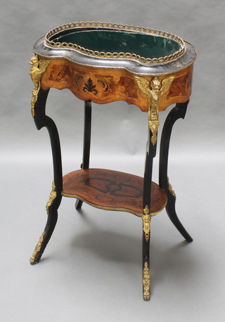 A 19th Century French inlaid Kingwood jardiniere of serpentine outline with gilt metal mounts on cabriole supports with undertier 33"h x 21"w x 15"d  
