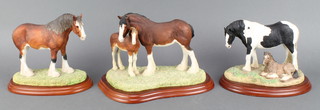 A Border Fine Arts group of a coloured mare and foal A0729 2000 7", do. Clydesdale mare and foal A0187 1999 8" and another Clydesdale Stain 2002 7" 