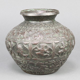 A 19th Century Eastern bronze vase of melon form with embossed vinous and figural decoration 9" x 3 1/2" diam. 