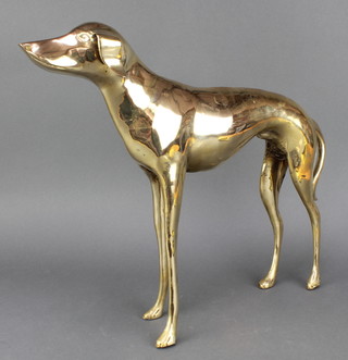 A polished brass figure of a standing dog 14" 