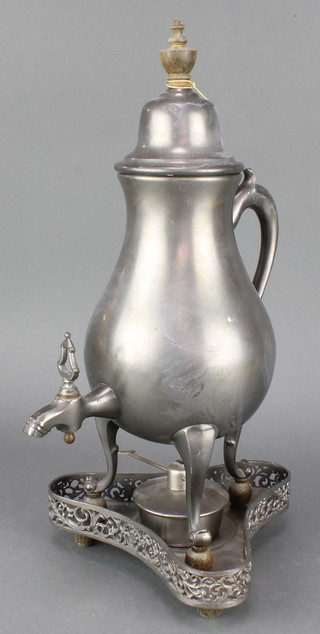 A pewter urn of baluster form raised on 3 cabriole supports together with turner and stand 15" 