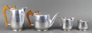 A Picquot ware 4 piece tea service comprising teapot, hotwater jug, lidded sugar bowl and milk jug 