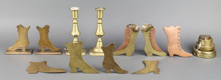 A pair of 18th/19th Century brass candlesticks, 4 brass graduated weights, 3 Victorian brass models of ladies boots and 2 others 