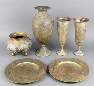 An Eastern polished gilt metal bowl raised on 3 supports 6" x 7", 2 Japanese chargers decorated dragons 10", a pair of Benares brass trumpet shaped vases 10" and a Benares brass club shaped vase 13" (some dents)