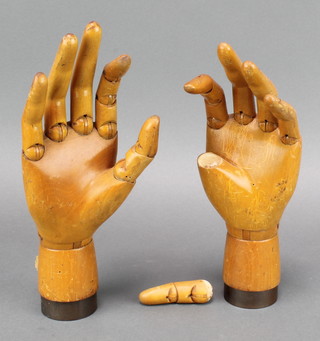 A pair of 19th/20th Century jointed wooden artist lay hands 12" 