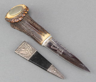 A Scottish Dirk with 3 1/2" blade marked J Nowill & Sons Skean-dhu with staghorn handle and leather and metal mounted scabbard