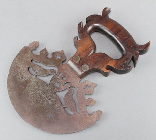 A Victorian polished steel demi-lune shaped pierced steel "vegetable" cutter decorated 2 birds and acorns, engraved 1863 AE.C with rosewood handle 9" overall 
