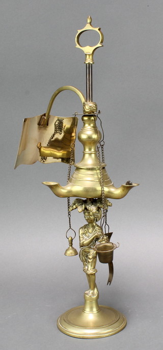 A 19th Century 3 light brass whale oil lamp supported by a figure of a standing boy with deflector 16" 