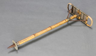 A bamboo folding shooting stick (for decorative purposes only) 