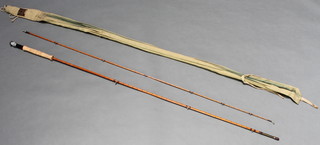 Hardy's The Perfection, a 2 section fly rod marked The Perfection Palakona Regd. Trademark complete with fabric sleeve