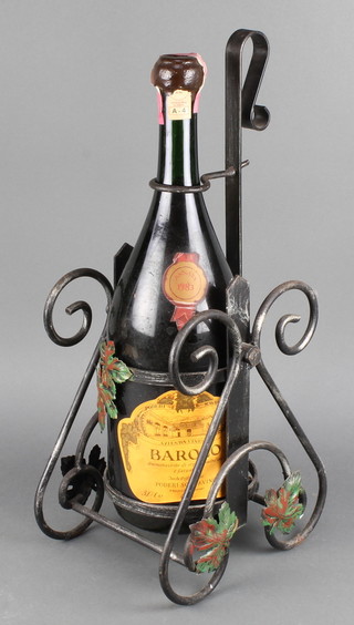A 3l bottle of Barolo contained in an iron cradle 