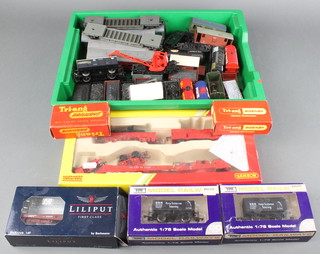 A Triang R15  milk wagon boxed, do. buffer stop, a Hornby R6365 break down pack boxed and a collection of rolling stock 