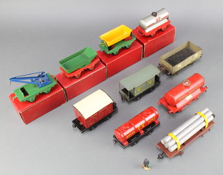 A Hornby MO grain truck, do. MO petrol tank wagon, do. rotary tipping wagon, do. side tipping wagon no.20 and a CV motor spirit tanker, do. Raily Daylight and other items of rolling stock 