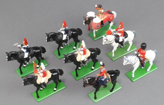 A W Britains model of HM Queen riding Burmese as Colonel in Chief of the Grenadier Guards, do. mounted figure of a guards officer, 2 mounted life guards, 2 horse guards and drummer 
