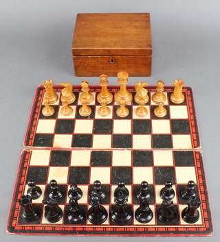 A Staunton's wooden chess set, contained in a Staunton mahogany box with replacement hinge, together with a board