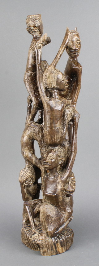 A carved African figure group of numerous people 19" 