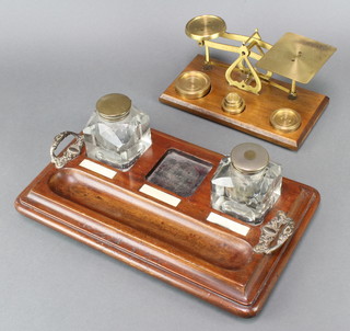 A pair of brass letter scales complete with weights and a mahogany and cut glass 3 bottle inkstand with pen recess 13" x 9" 